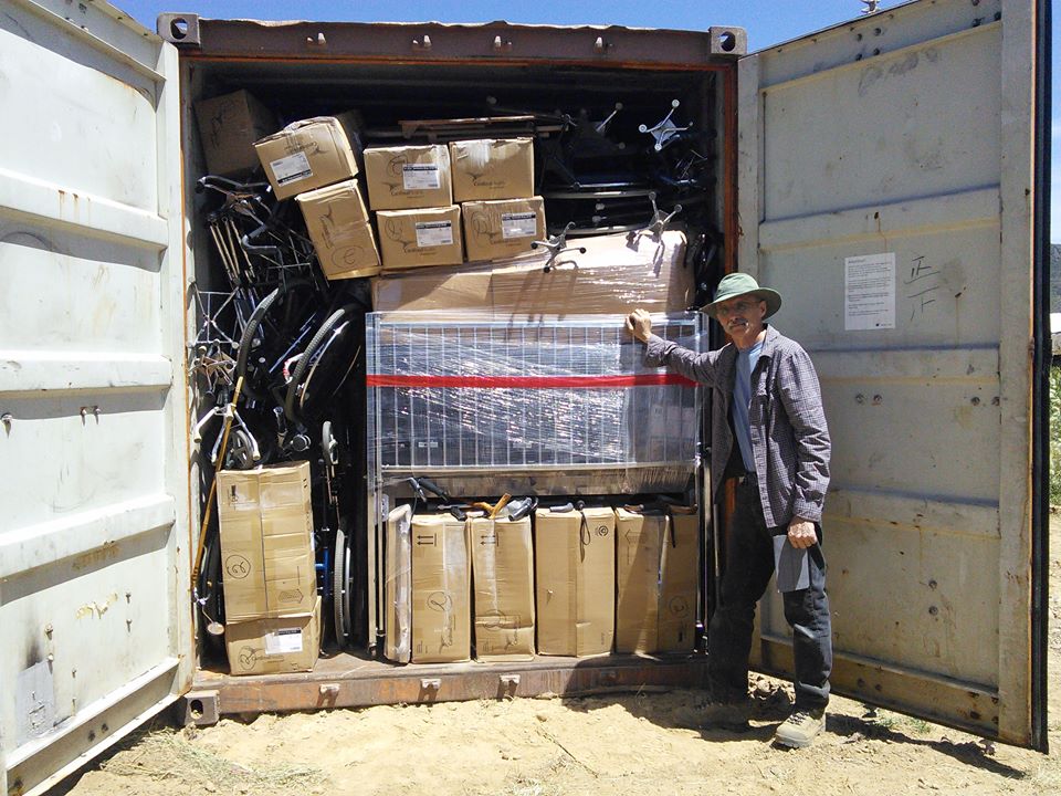 Ray in Bolivia in March 2016 helping unload supplies shipped from Minnesota.